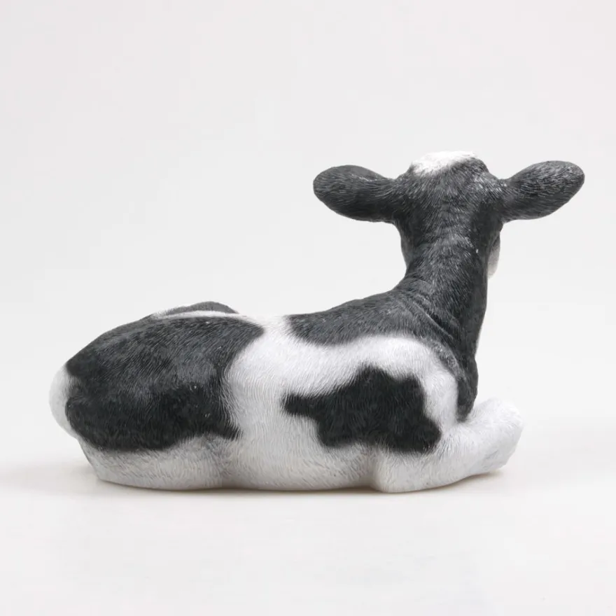Vache couchée en résine 34 x 21 x 21.5 cm