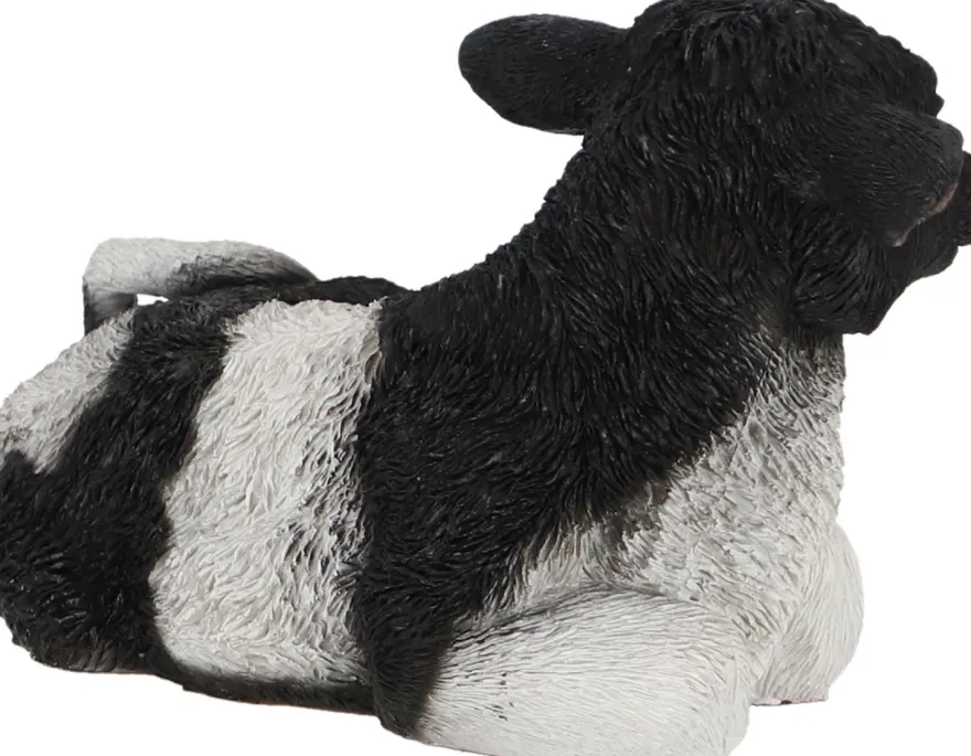 Veau noir et blanc couché en résine (Petit modèle)