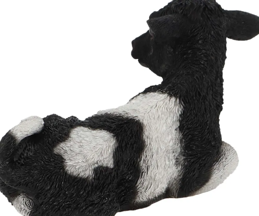 Veau noir et blanc couché en résine (Petit modèle)