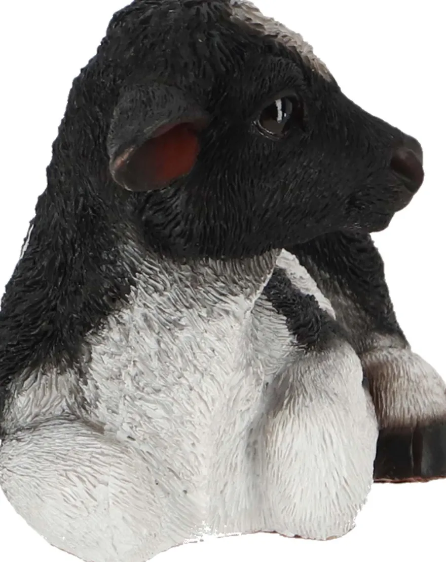 Veau noir et blanc couché en résine (Petit modèle)