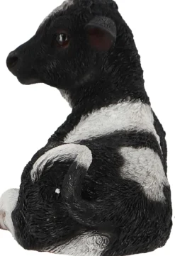 Veau noir et blanc couché en résine (Petit modèle)
